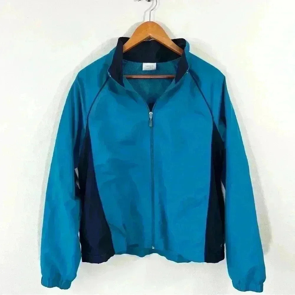 Danskin Now teal and navy wind breaker